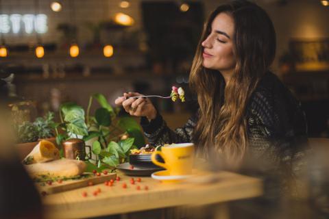Girl eating pasta